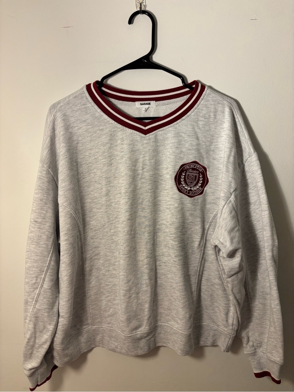 Garage Women’s Light Gray V-Neck Sweater with Maroon Trim and Crest
